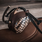 AO three-piece Dutch falconry hood with genuine python skin inlays