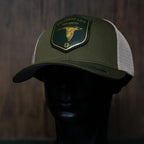 AO duck hunting cap with leather patch and gold-foil detail