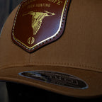AO duck hunting cap with leather patch and gold-foil detail