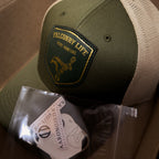 AO hare hunting cap with leather patch and gold-foil detail