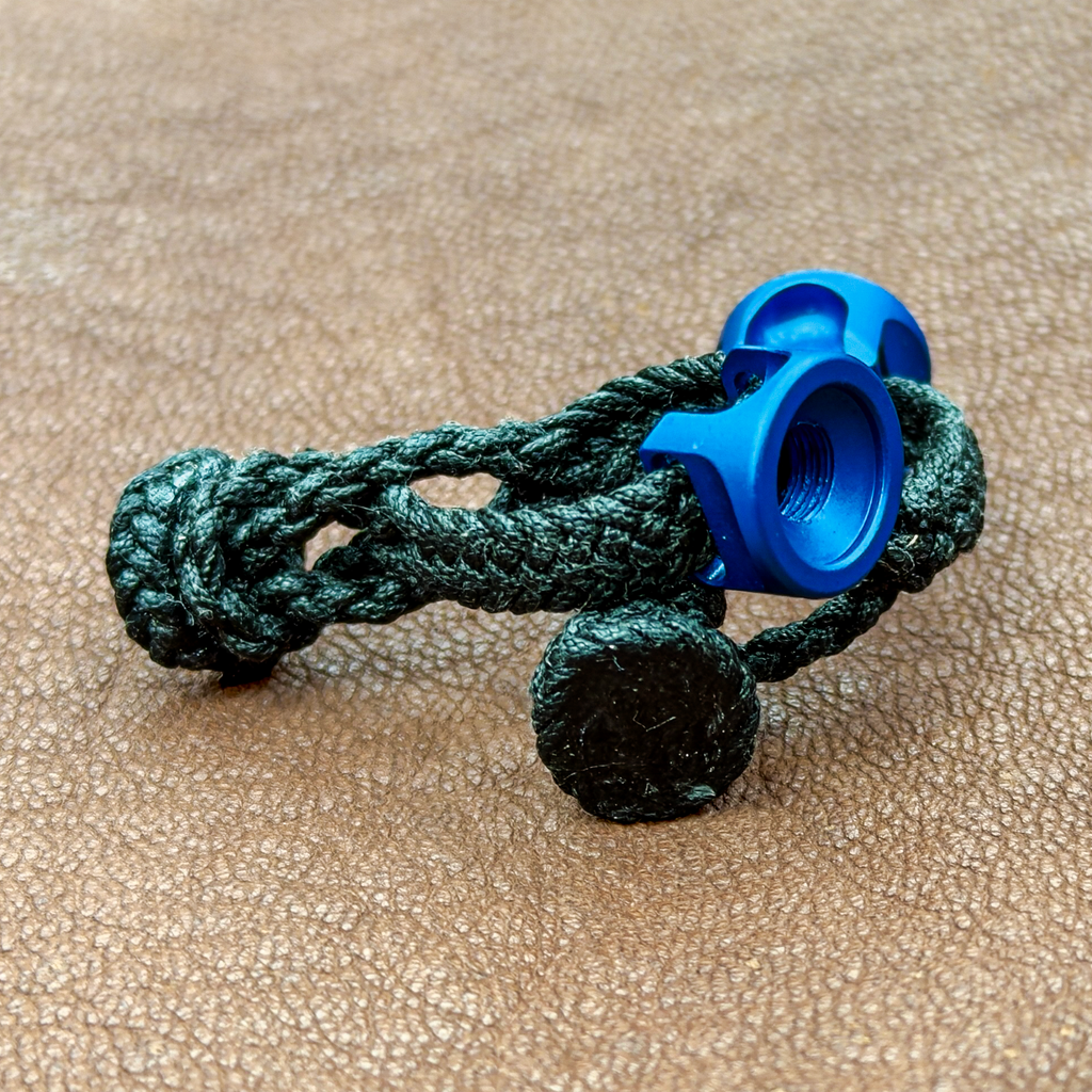 Macro view of black braided Dacron transmitter strap with blue Marshall EZ-Twist fitting